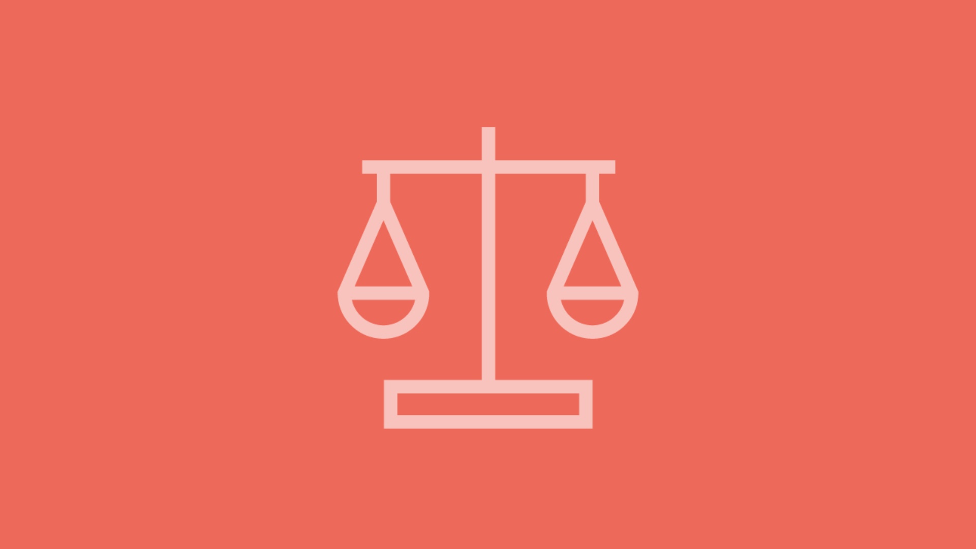 Eine Waage steht für Recht als Symbol auf rotem Hintergrund