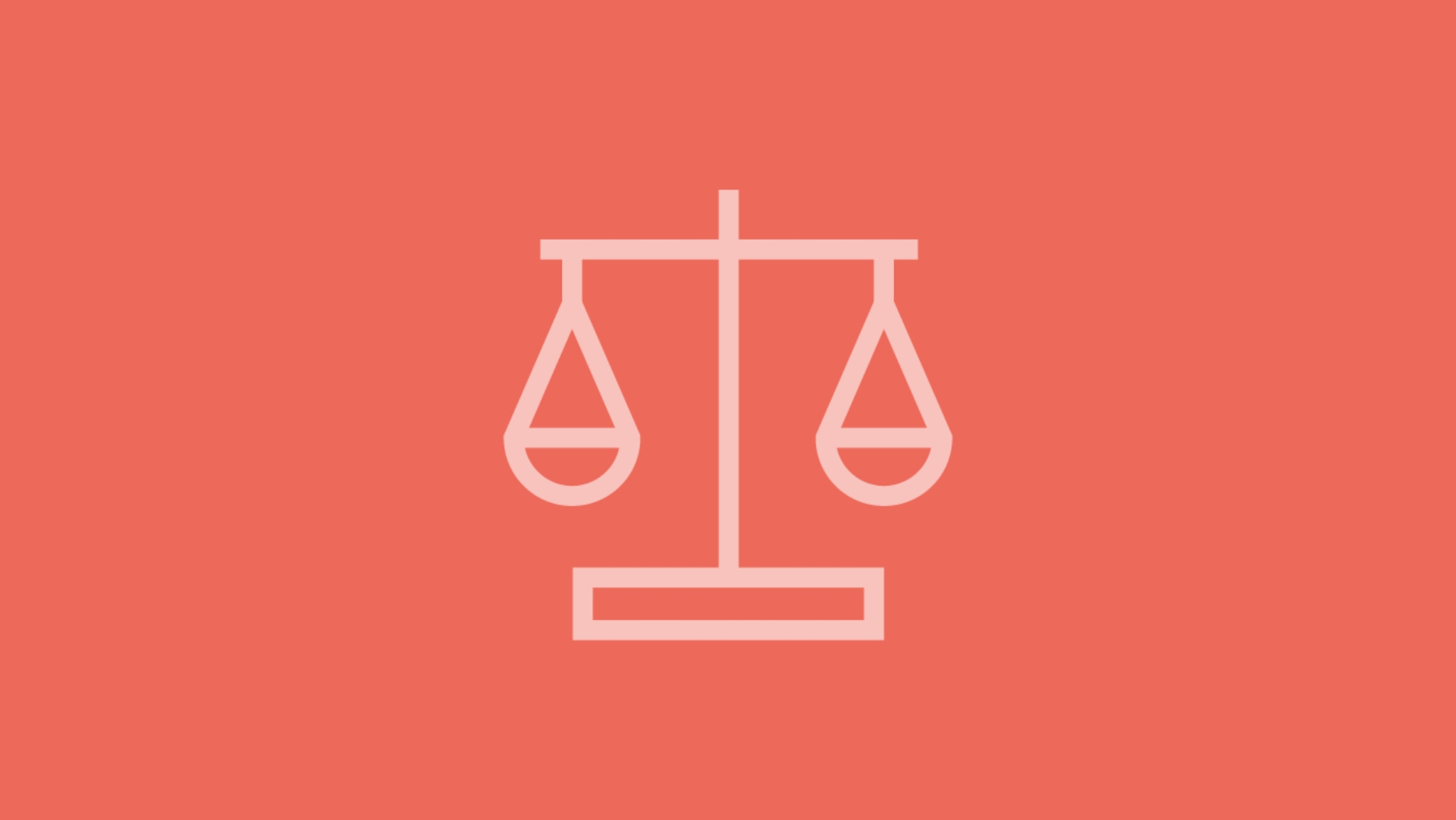 Eine Waage steht für Recht als Symbol auf rotem Hintergrund